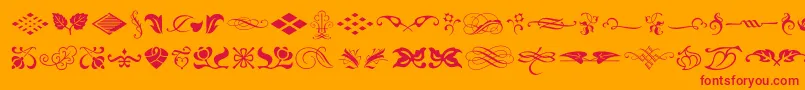 Czcionka TypeEmbellishmentsOneLetPlain.1.0 – czerwone czcionki na pomarańczowym tle