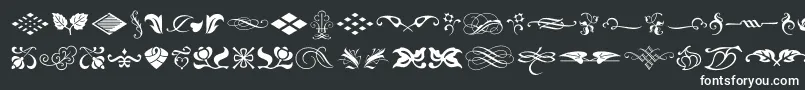 TypeEmbellishmentsOneLetPlain.1.0-fontti – valkoiset fontit mustalla taustalla