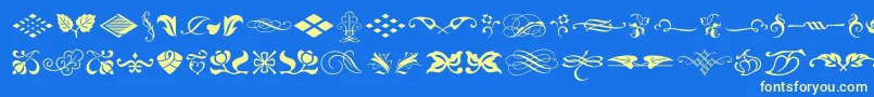 TypeEmbellishmentsOneLetPlain.1.0 Font – Yellow Fonts on Blue Background