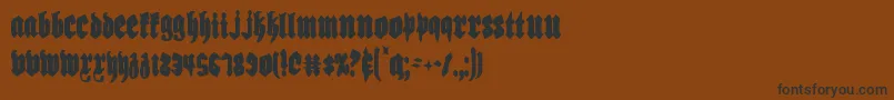 Biergartenc-fontti – mustat fontit ruskealla taustalla