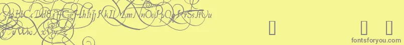 PlatthandDemo-fontti – harmaat kirjasimet keltaisella taustalla