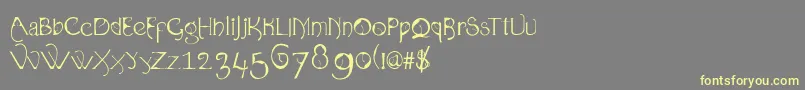 Organica90 Font – Yellow Fonts on Gray Background