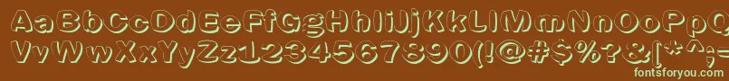 フォントSpherics – 緑色の文字が茶色の背景にあります。