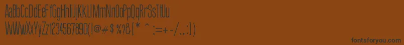 フォントThinDesign – 黒い文字が茶色の背景にあります