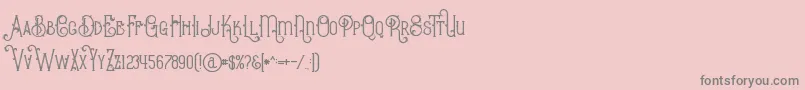 BurenoRegular-Schriftart – Graue Schriften auf rosa Hintergrund