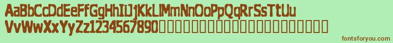 Thedogho Font – Brown Fonts on Green Background