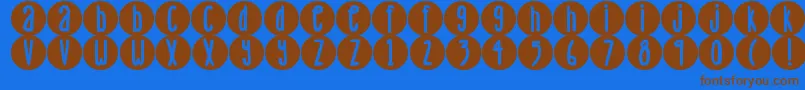 Fonte DjbLemonHeadDots – fontes marrons em um fundo azul