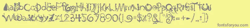 BodyPiercingChains-fontti – harmaat kirjasimet keltaisella taustalla