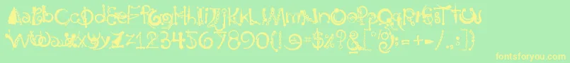 BodyPiercingChains-fontti – keltaiset fontit vihreällä taustalla