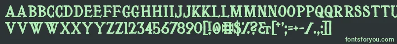 フォントLeVoyageDansLaLune – 黒い背景に緑の文字