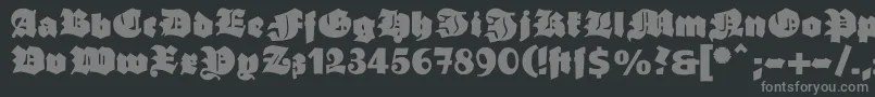 フォントGanzgrobegotisch – 黒い背景に灰色の文字