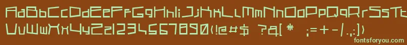 フォントCubicsub – 緑色の文字が茶色の背景にあります。