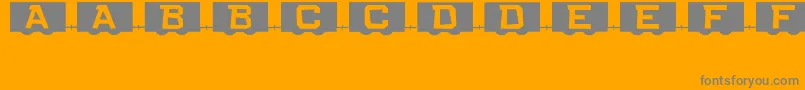 フォントRailCarsJl – オレンジの背景に灰色の文字