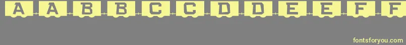 Шрифт RailCarsJl – жёлтые шрифты на сером фоне