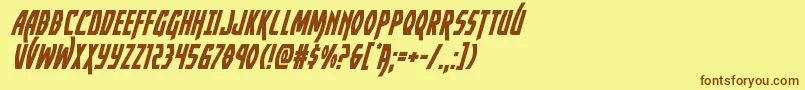 フォントYankeeclipperital – 茶色の文字が黄色の背景にあります。