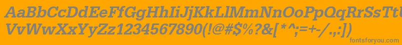 UrwegyptiennetmednarOblique-fontti – harmaat kirjasimet oranssilla taustalla