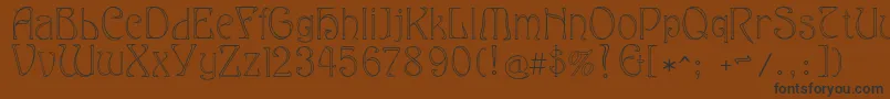 Eddanarrow Font – Black Fonts on Brown Background