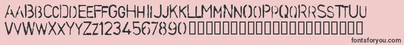 フォントStencilcaseBold – ピンクの背景に黒い文字