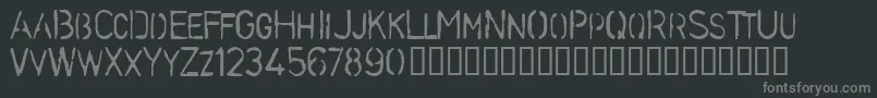 StencilcaseBold-fontti – harmaat kirjasimet mustalla taustalla