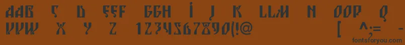 フォントBlagovestsixc – 黒い文字が茶色の背景にあります