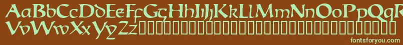 フォントEscudedisplayssk – 緑色の文字が茶色の背景にあります。