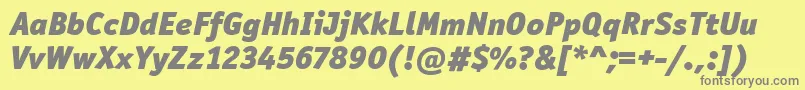 OfficinaSanItcBlackItalic-fontti – harmaat kirjasimet keltaisella taustalla