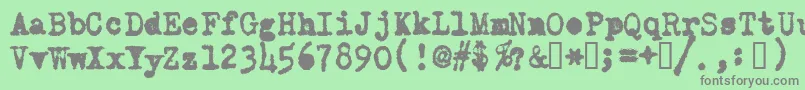 OldTypewriterMessy Font – Gray Fonts on Green Background