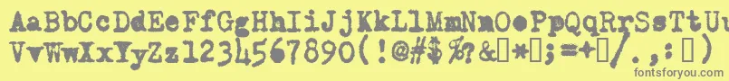 Police OldTypewriterMessy – polices grises sur fond jaune