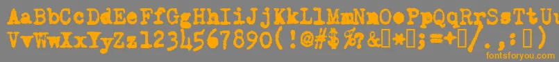 Czcionka OldTypewriterMessy – pomarańczowe czcionki na szarym tle