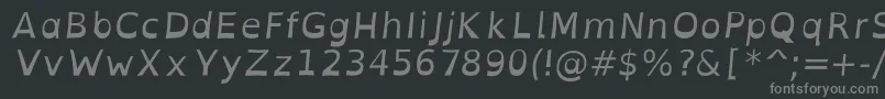 Czcionka OpendyslexicaltaItalic – szare czcionki na czarnym tle