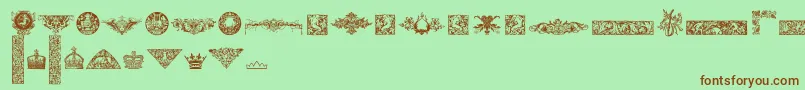 CornucopiaOfDingbatsFour Font – Brown Fonts on Green Background