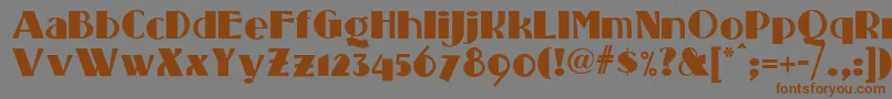 フォントStanding – 茶色の文字が灰色の背景にあります。