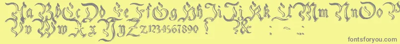 CharterwellNo2-fontti – harmaat kirjasimet keltaisella taustalla