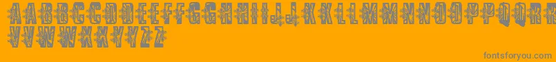 フォントVtksLowrider – オレンジの背景に灰色の文字
