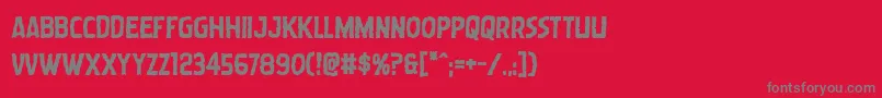 Wormcuisinebold-Schriftart – Graue Schriften auf rotem Hintergrund