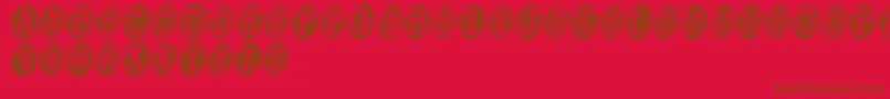 PowderfingerSmudged-Schriftart – Braune Schriften auf rotem Hintergrund