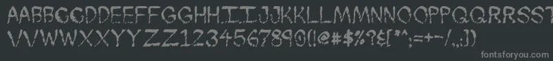 Skuntch-fontti – harmaat kirjasimet mustalla taustalla