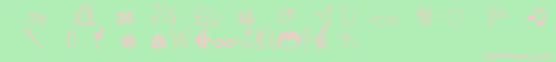 Charmingsymbols-fontti – vaaleanpunaiset fontit vihreällä taustalla