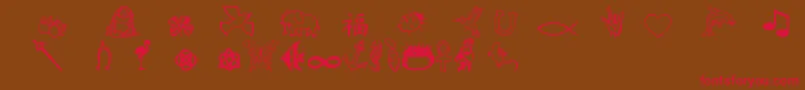 フォントCharmingsymbols – 赤い文字が茶色の背景にあります。