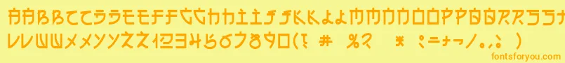 フォントDsehc – オレンジの文字が黄色の背景にあります。