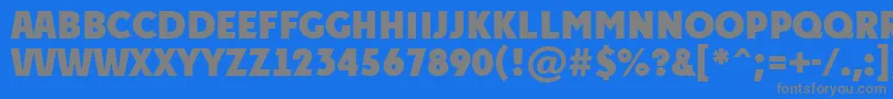 フォントPlakattitulExtrabold – 青い背景に灰色の文字
