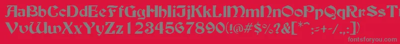 BuckinghamRegular-fontti – harmaat kirjasimet punaisella taustalla