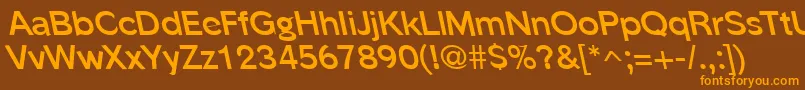 フォントPhinsterleftyBold – オレンジ色の文字が茶色の背景にあります。