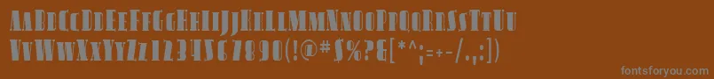 Sfavondalesccond-fontti – harmaat kirjasimet ruskealla taustalla