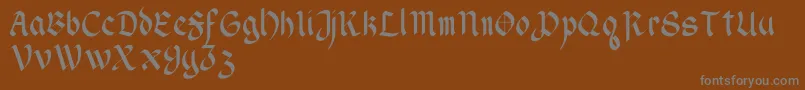 WendellV1-fontti – harmaat kirjasimet ruskealla taustalla