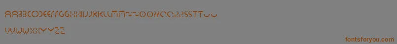 Essedicom Font – Brown Fonts on Gray Background