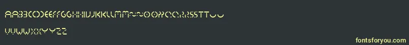 フォントEssedicom – 黒い背景に黄色の文字