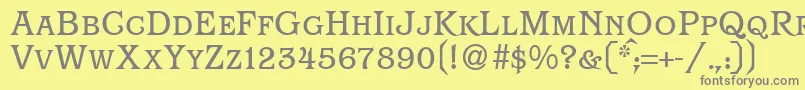 Шрифт ParagonsmcRegularDb – серые шрифты на жёлтом фоне
