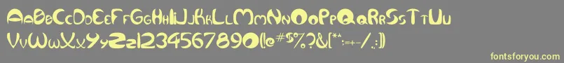 Qurve Font – Yellow Fonts on Gray Background