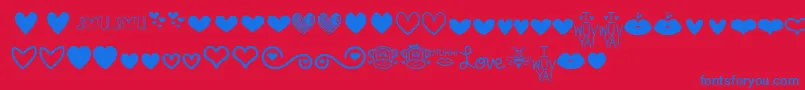 フォントMfLoveDings – 赤い背景に青い文字